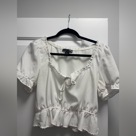 The shirt is from forever 21 and a size large but runs like a medium. - Picture 1 of 1